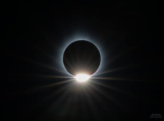 Total solar eclipse showing the dramatic diamond ring effect during totality.